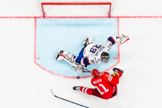 Evgeni Malkin of Russia against Goaltender Henrik Haukeland