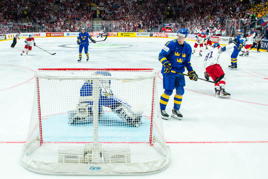 Goaltender Henrik Lundqvist and Robert Hägg of Sweden look