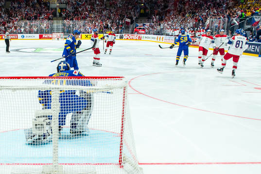 Goaltender Henrik Lundqvist of Sweden looks dejected