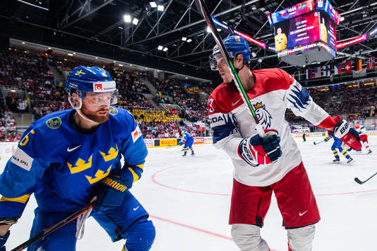 Adam Larsson of Sweden against Dmitrij Jaskin of Czech