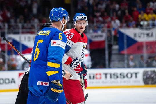 Adam Larsson of Sweden against Dmitrij Jaskin of Czech