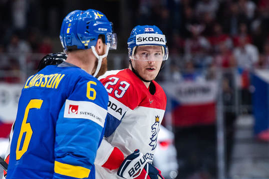 Adam Larsson of Sweden against Dmitrij Jaskin of Czech
