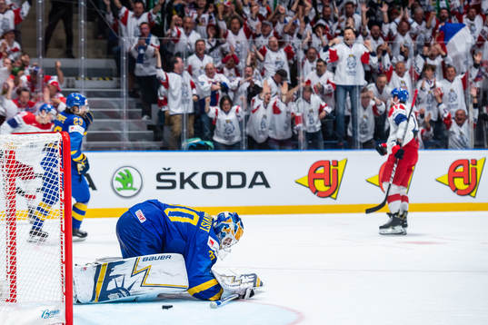 Goaltender Henrik Lundqvist of Sweden looks dejected