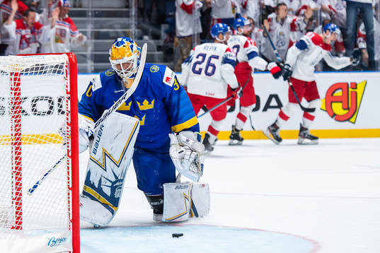 Goaltender Henrik Lundqvist of Sweden looks dejected
