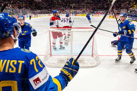 Elias Pettersson and William Nylander of Sweden celebrate
