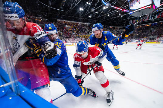 Oskar Lindblom and Mattias Ekholm of Sweden against Dominik