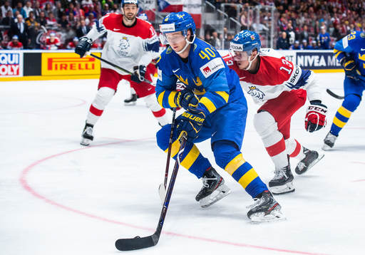 Elias Pettersson of Sweden and Jakub Vrana of Czech Republic