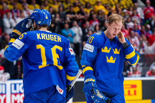 Marcus Krüger and Dennis Rasmussen of Sweden look dejected