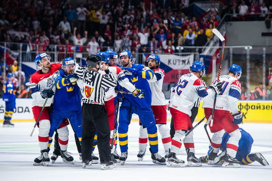 Anton Lander and Marcus Pettersson of Sweden fights Ondrej