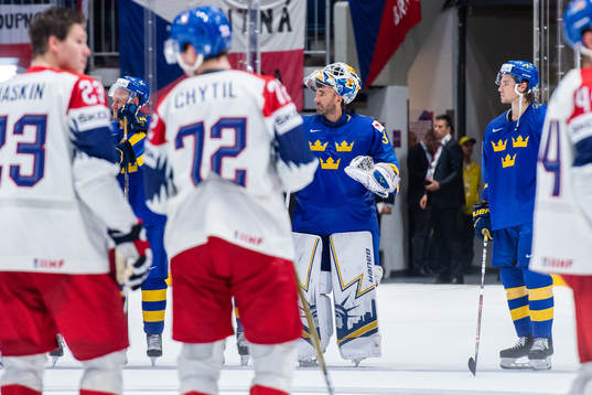Henrik Lundqvist and Adrian Kempe of Sweden look dejected