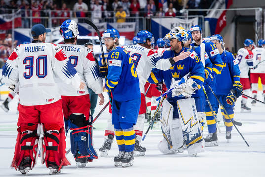 Jakub Voracek of Czech Republic and Henrik Lundqvist and