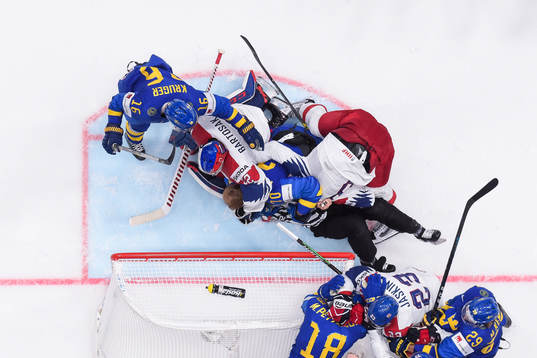 Goaltender Patrik Bartosak and Radko Gudas of Czech