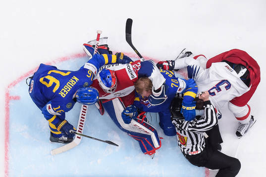 Goaltender Patrik Bartosak and Radko Gudas of Czech