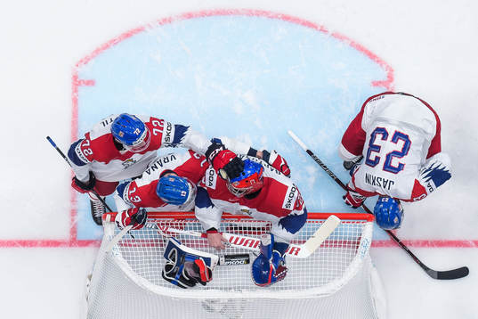 Filip Chytil , Jakub Vrana , goaltender Patrik Bartosak and