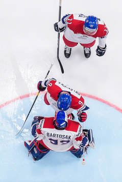 Michal Moravcik , David Sklenicka and goaltender Patrik