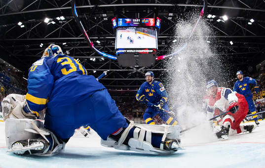 Goaltender Henrik Lundqvist of Sweden and Jan Kovar of