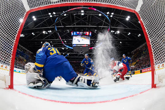 Goaltender Henrik Lundqvist of Sweden and Jan Kovar of