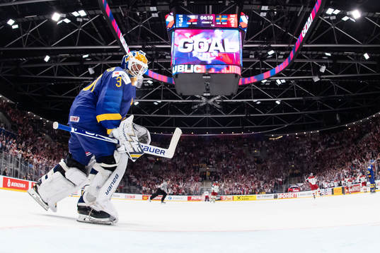 Goaltender Henrik Lundqvist of Sweden looks dejected