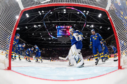 Goaltender Henrik Lundqvist and Patric Hörnqvist of Sweden