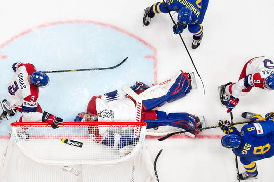 Goaltender Patrik Bartosak of Czech Republic saves a shot