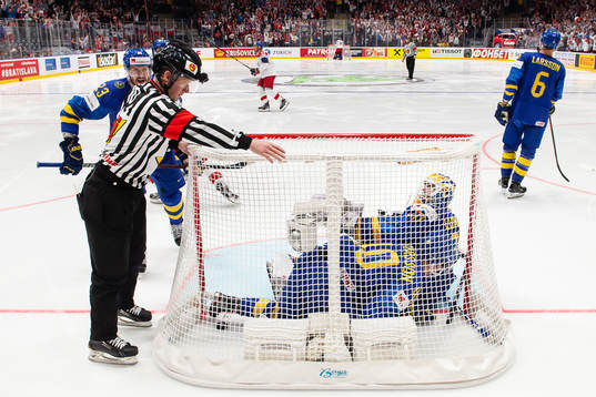Oliver Ekman Larsson, Elias Pettersson and goaltender