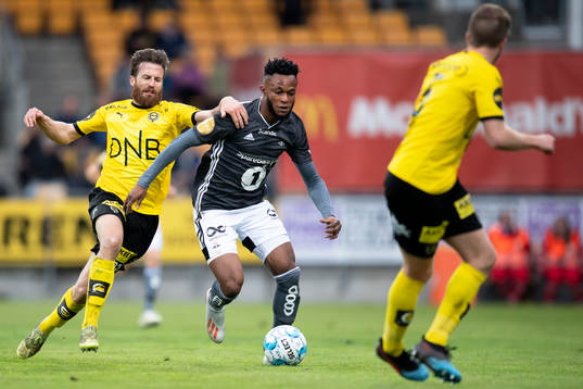 Aleksander Melgalvis of Lillestrøm and Samuel Adegbenro of