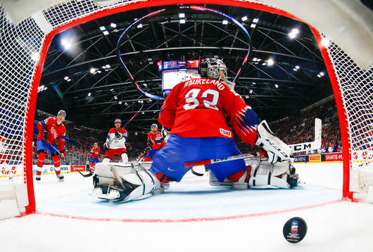 Goaltender Henrik Haukeland of Norway lets in the 1-4 goal