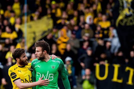 Aleksander Melgalvis and goalkeeper Marko Maric of