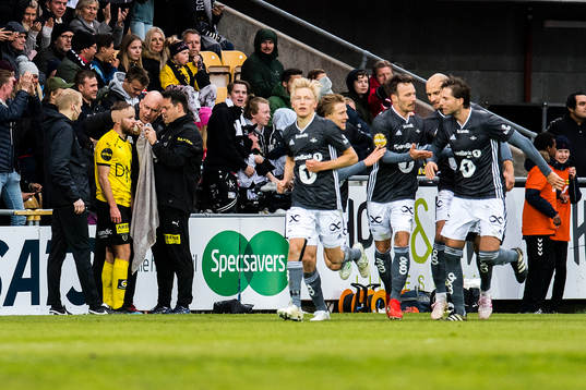 Simen Rafn of Lillestrøm  and players of Rosenborg