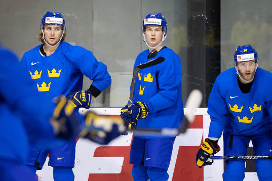 Adrian Kempe, Elias Pettersson and Mattias Ekholm of Sweden