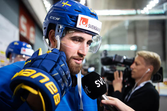 Erik Gustafsson of Sweden is being interviewed by media