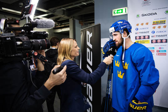 Erik Gustafsson (R) of Sweden is being interviewed by Jenny