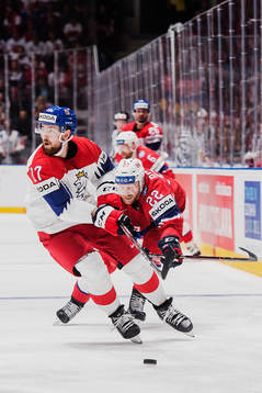 Filip Hronek of Czech Republic and Martin Røymark of Norway