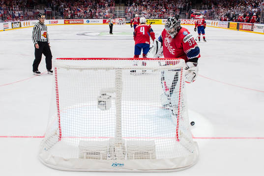 Goaltender Henrik Haukeland of Norway looks dejected