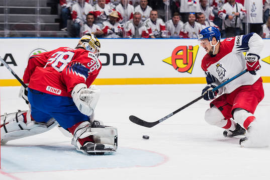 goaltender Henrik Holm of Norway and Jan Kovar of Czech