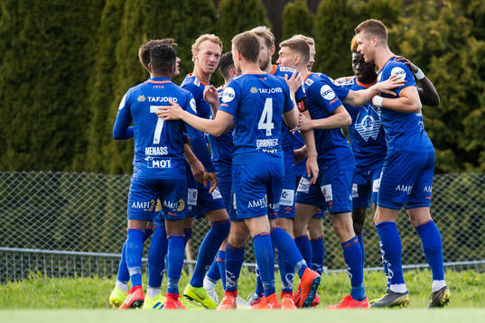 Pape Habib Gueye of Aalesund celebrates with teammates