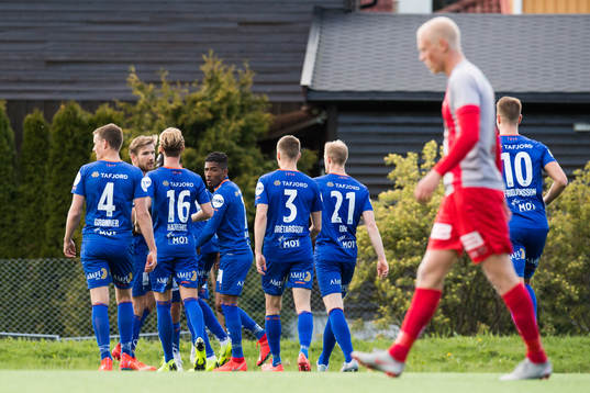 Pape Habib Gueye of Aalesund celebrates with teammates