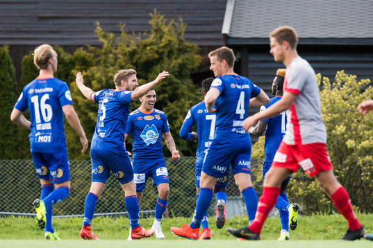 Pape Habib Gueye of Aalesund celebrates with teammates