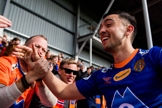 Niklas Castro of Aalesund celebrates with the supporters