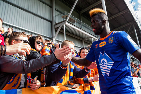 Pape Habib Gueye of Aalesund celebrates with the supporters