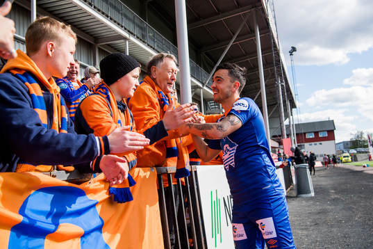 Niklas Castro of Aalesund celebrates with the supporters