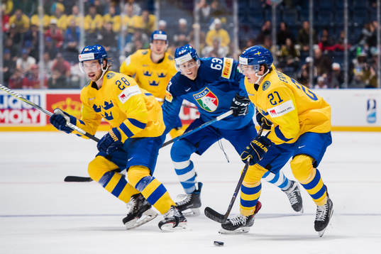 Elias Lindholm Loui Eriksson of Sweden and Alex Lambacher