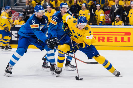 Marco Insam and Diego Kostner of Italy against Adrian Kempe