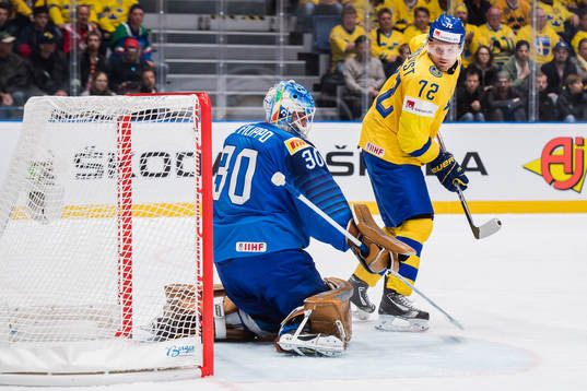Patric Hörnqvist of Sweden scores 0-8 behind goaltender