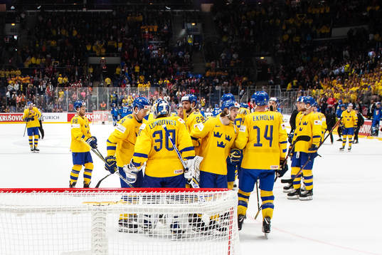 Players of Sweden celebrate their win