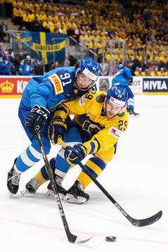 Marco Rosa of Italy in action against Mario Kempe of Sweden