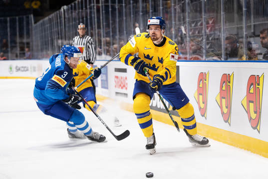 Markus Gander of Italy and Anton Lander of Sweden