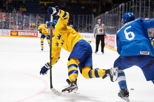 William Nylander of Sweden gets tackled by Sean McMonagle
