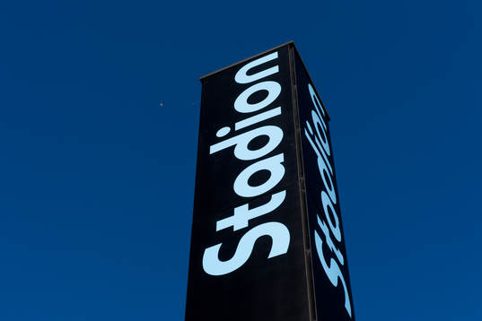 Logotype för Stadion