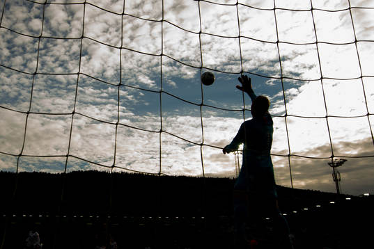 The silhouette of goalkeeper Viljar Myhra of Strømsgodset